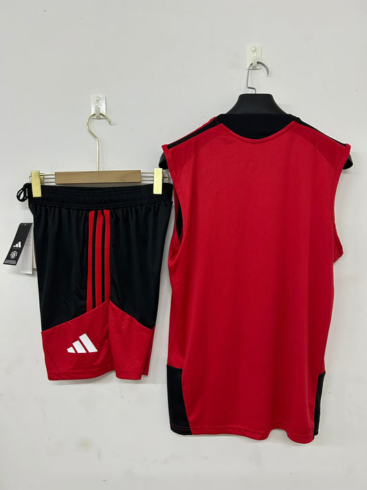 Manchester united completo rosso con canottiera
