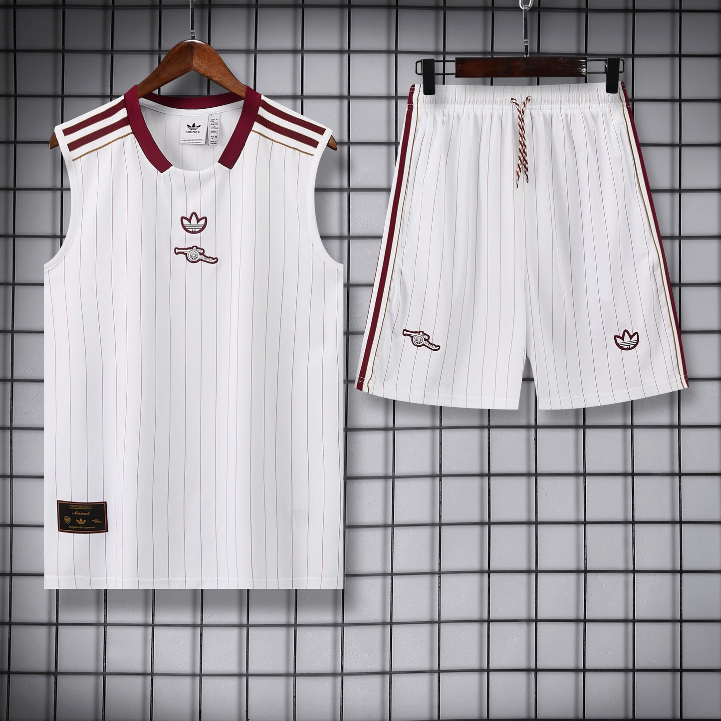 Arsenal completo con canottiera bianco a righe