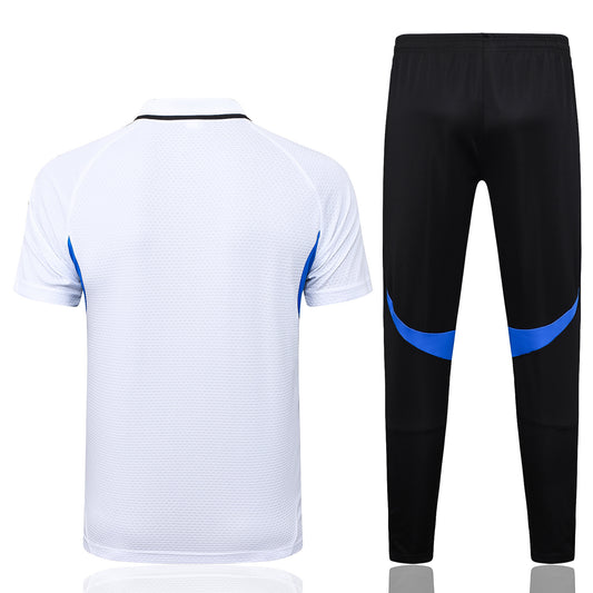 Manchester U. bianco 2026 Training Set – Polo + Pants Slim Fit