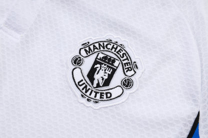 Manchester U. bianco 2026 Training Set – Polo + Pants Slim Fit