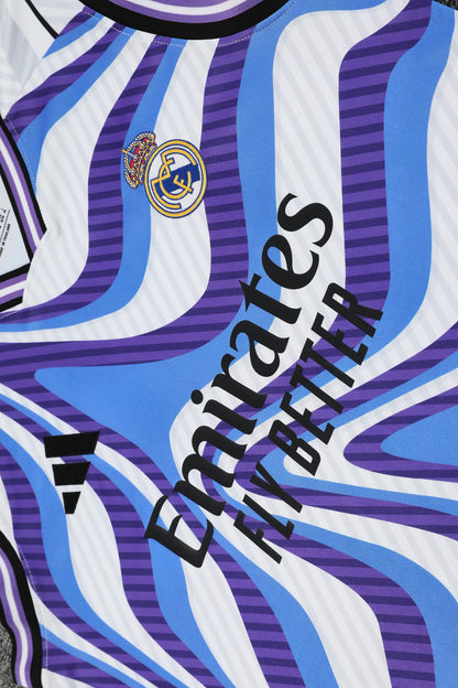 Real Madrid completo con canottiera fantasy viola