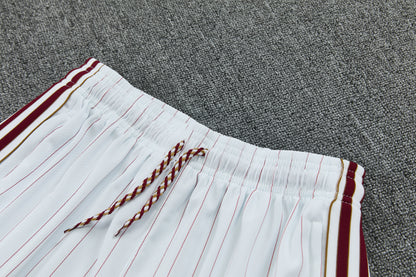 Arsenal completo con canottiera bianco a righe